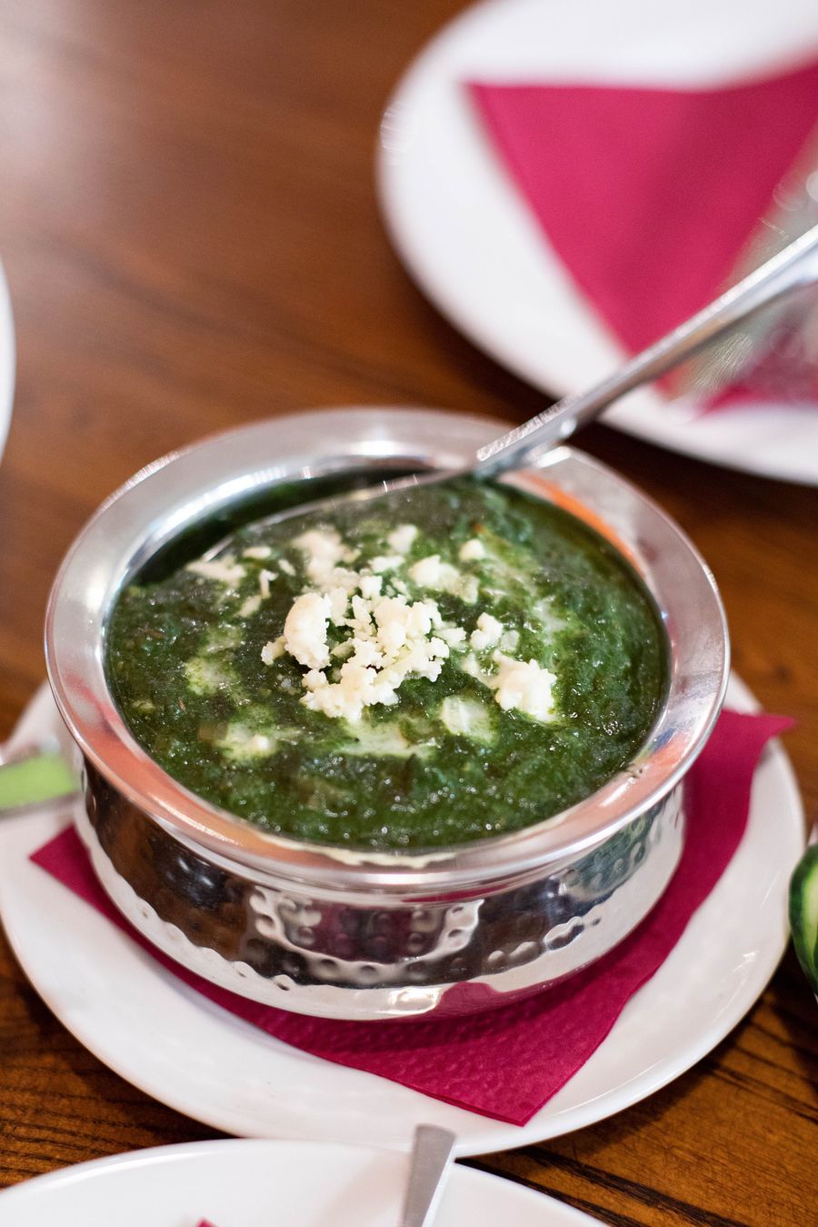 Saag paneer in a hammered silver bowl