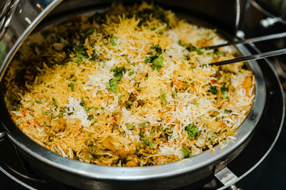 A catering tray of fragrant biryani